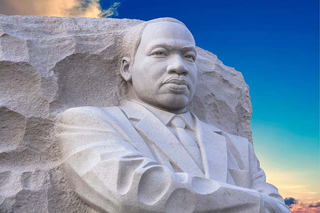 Martin Luther King Jr Memorial, portrait of the civil rights leader carved in granite, dedicated by President Barack Obama in 2011.