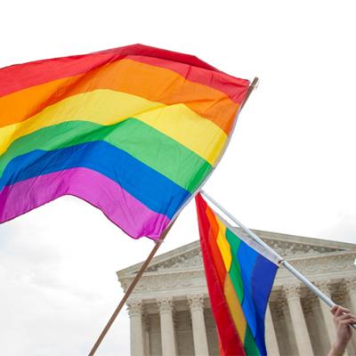 Two pride flags waved in front of Supreme Court